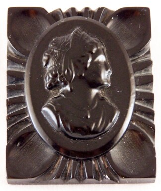 BP237 black bakelite cameo pin